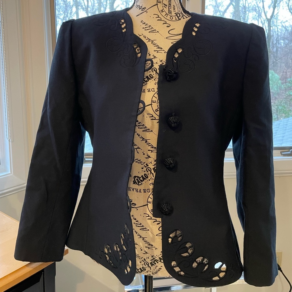 Black blazer with fabric buttons and embroidery detailing